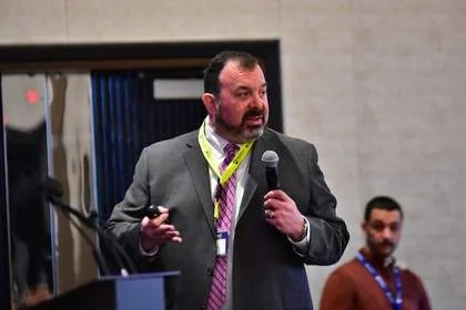 Speaker presenting at Tech Valley Cybersecurity Symposium