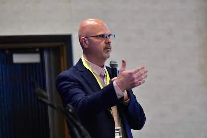 Speaker presenting at Tech Valley Cybersecurity Symposium